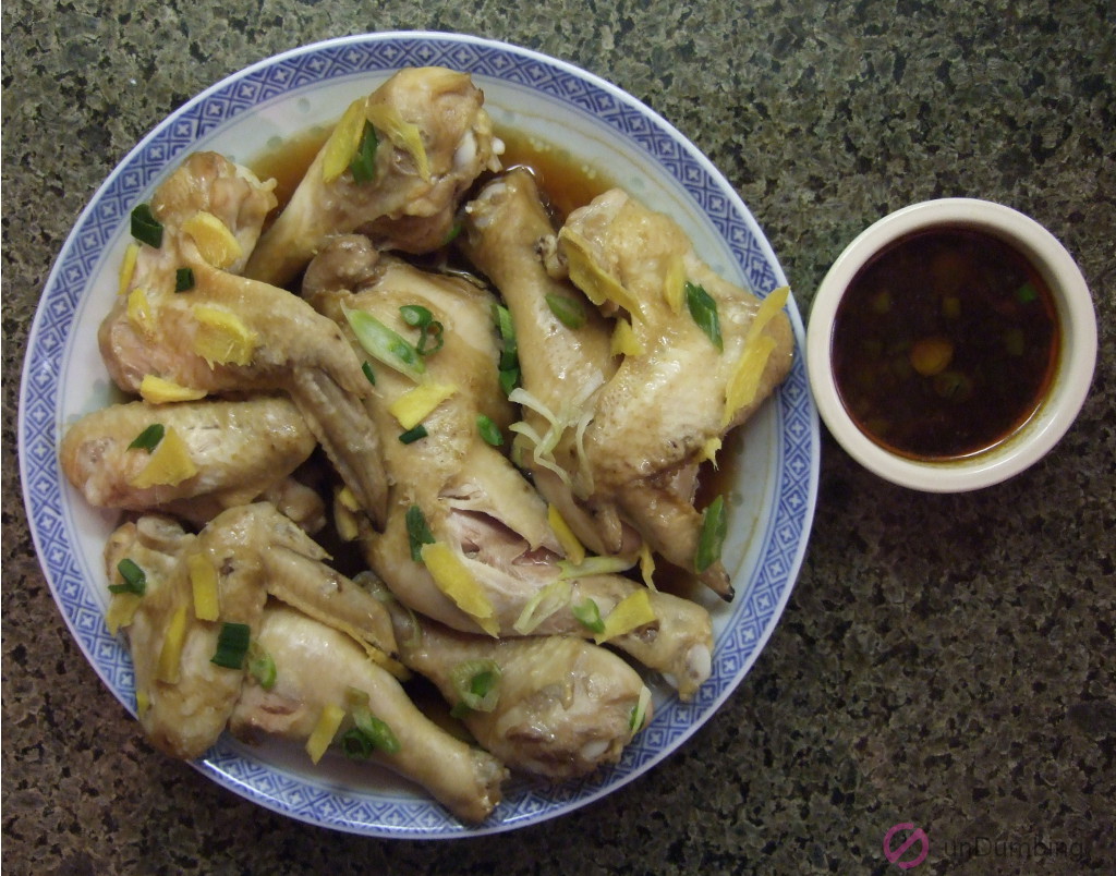 Chinese steamed chicken wings, drumsticks, and leg with dipping sauce