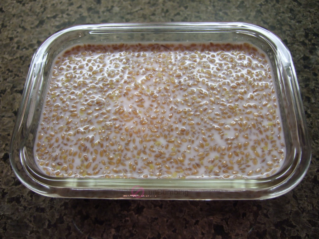 Glass container of milk, flaxseed, and honey