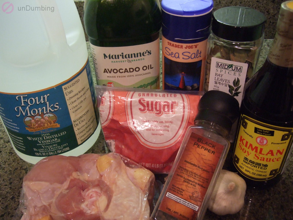 White vinegar, oil, salt, bay leaves, soy sauce, sugar, peppercorn, chicken, and garlic