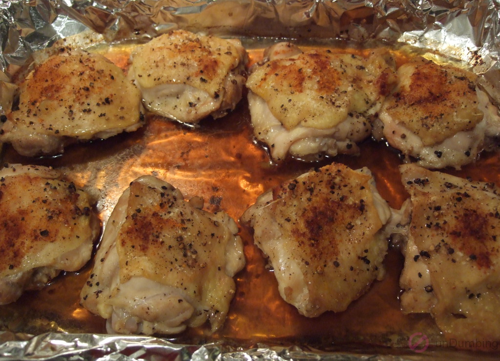 Chicken thighs baked in a baking pan