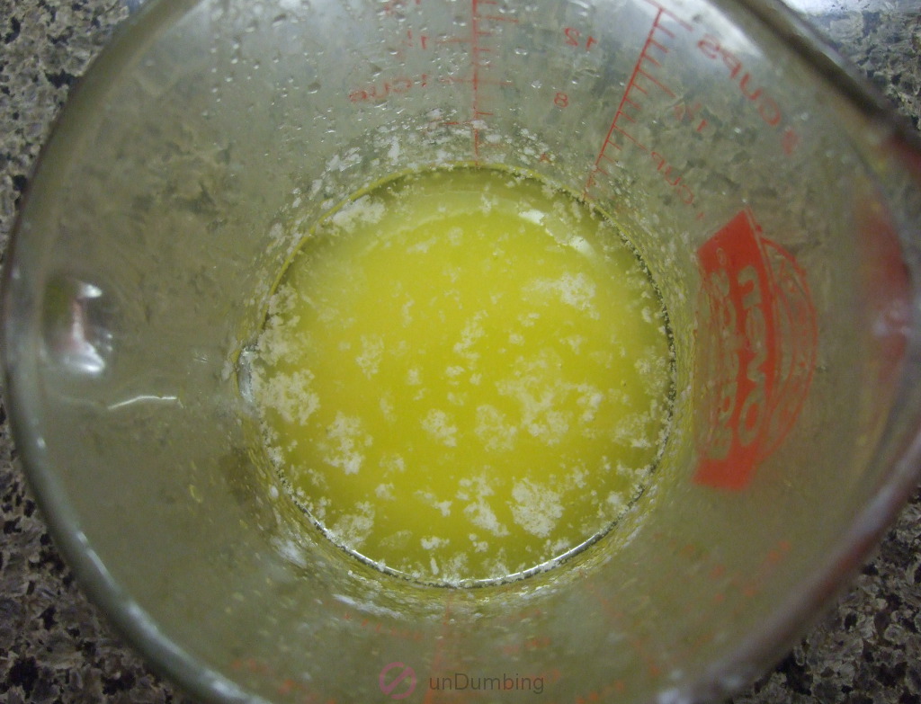 Melted butter in a measuring cup