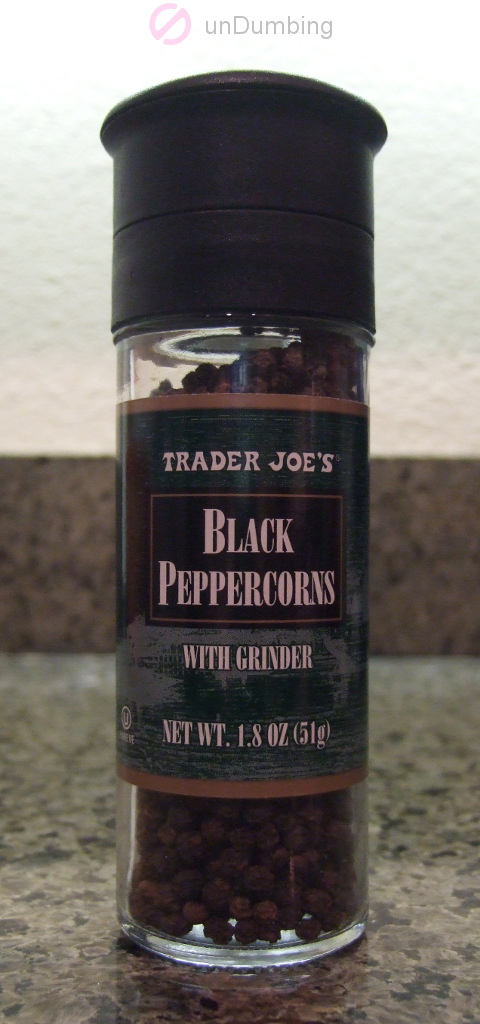 Bottle of black peppercorns