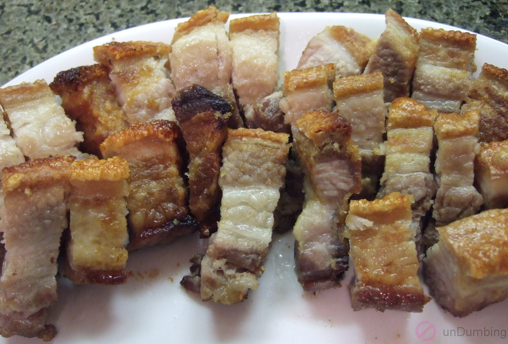 Cut pork belly on a white plate (Try 2)