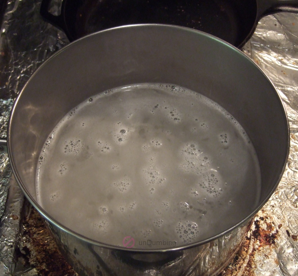 Bringing saucepan of rice and water to a boil