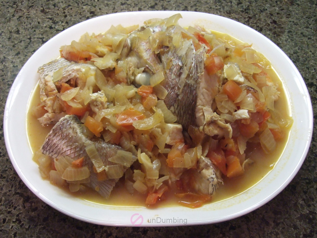 Fish stew on a white plate