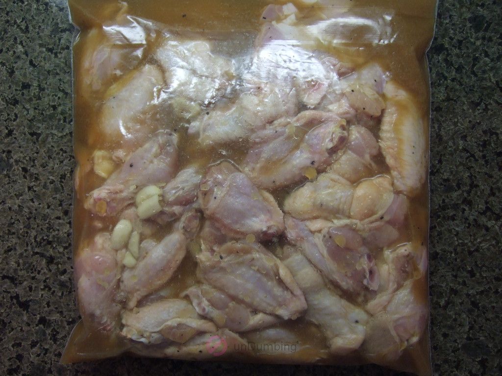 Wings marinating in a plastic bag