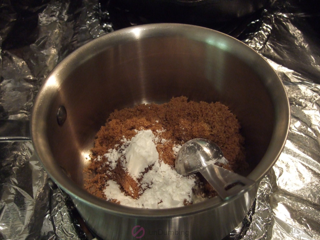 Brown sugar and corn starch scooped in a saucepan