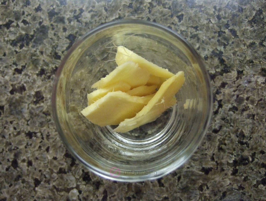 Ginger slices in a shot glass