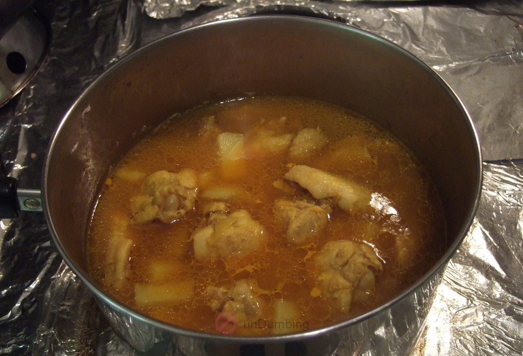 Turmeric liquid added to the saucepan