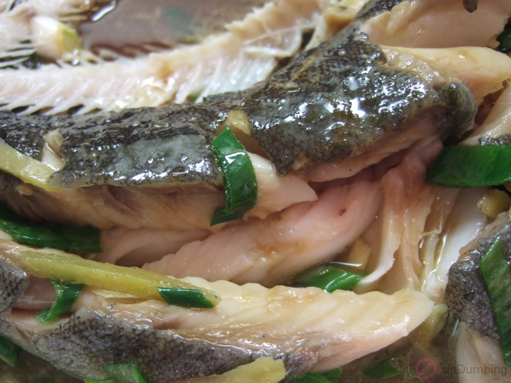 Steamed fish with ginger and spring onions
