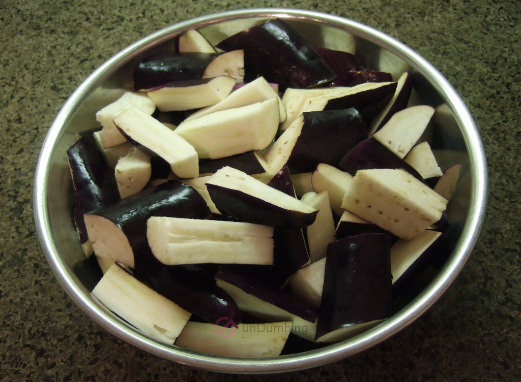 Cut eggplant in a stainless steel bowl