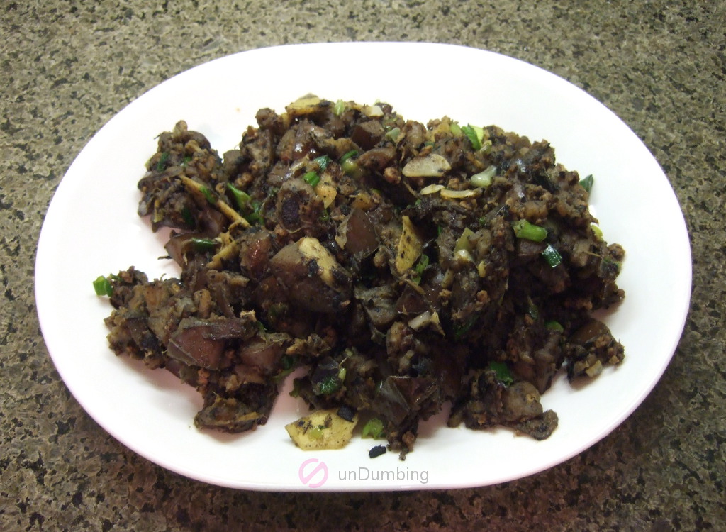 Chinese eggplant and minced pork on a white plate