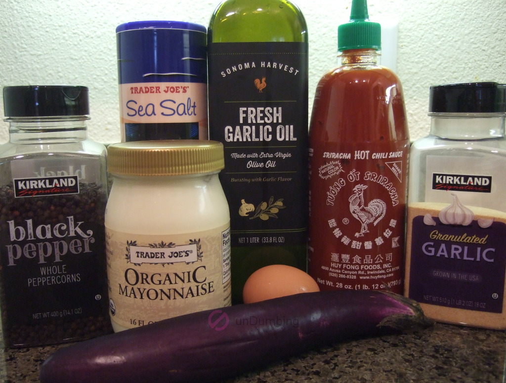 Black pepper, salt, olive oil, Sriracha sauce, granulated garlic, mayonnaise, egg, and eggplant