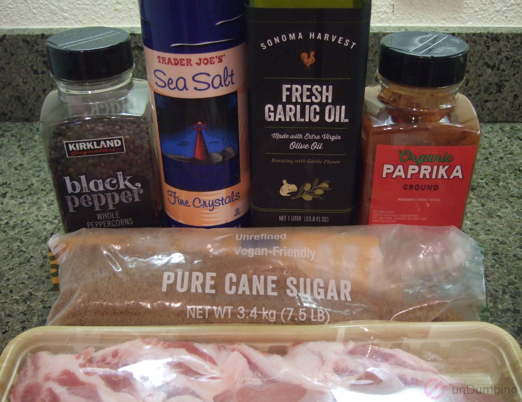 Black pepper, salt, olive oil, paprika, brown sugar, and pork chops