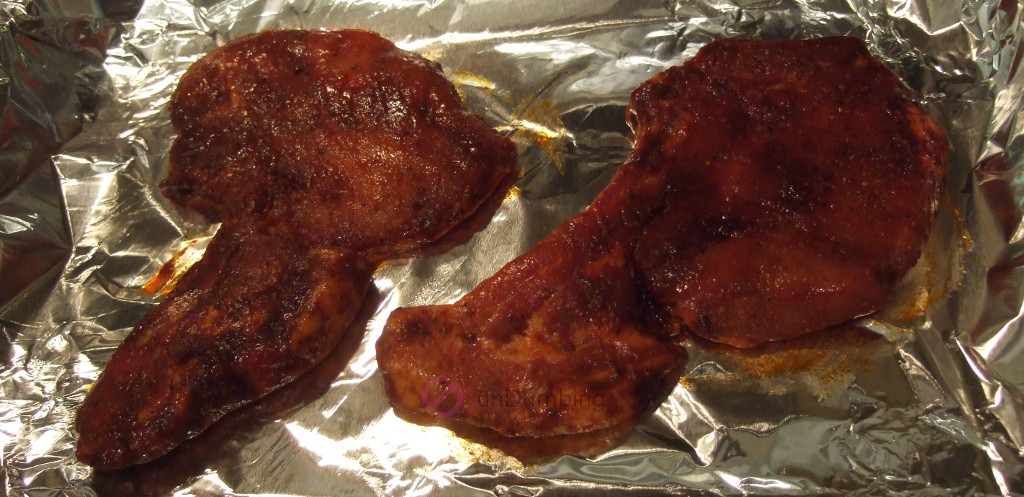 Pork chops on a foil-lined baking pan (Try 2)