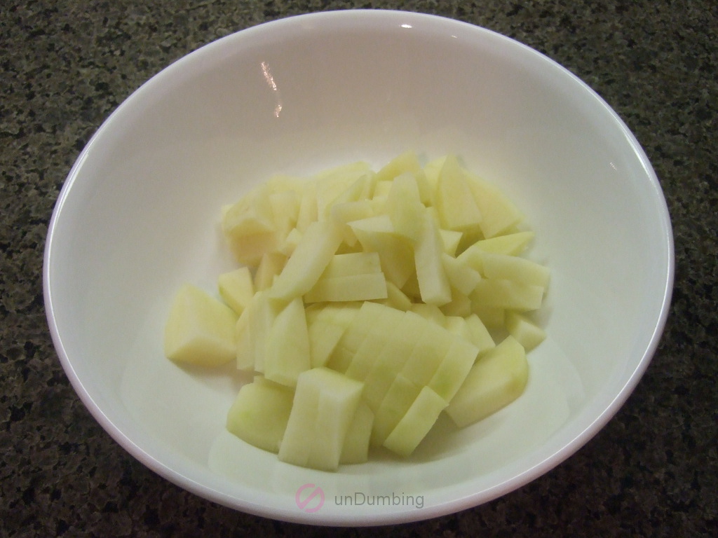 Diced potatoes in a white bowl