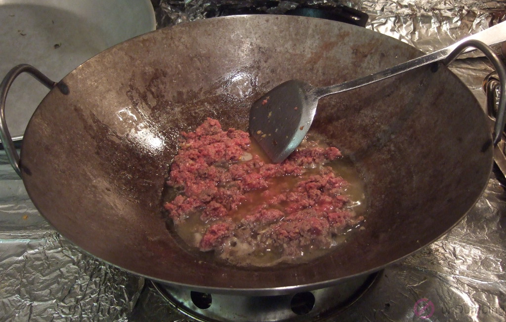 Beef cooking in a wok