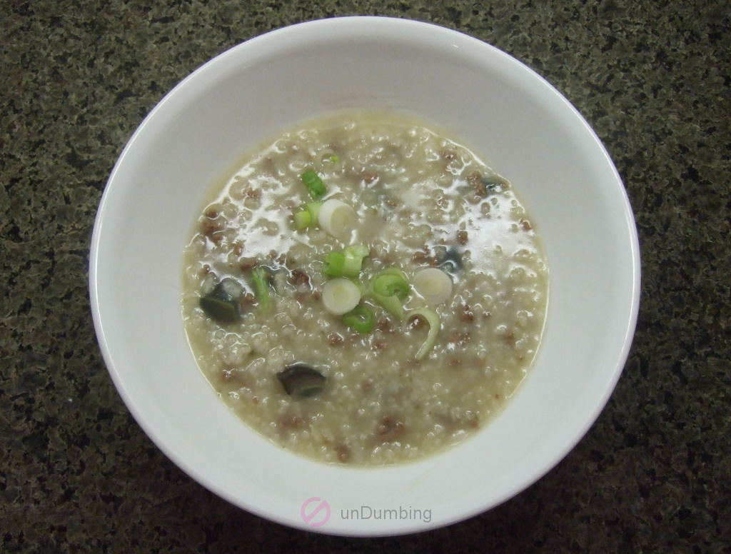Beef congee in a white bowl (Try 2)