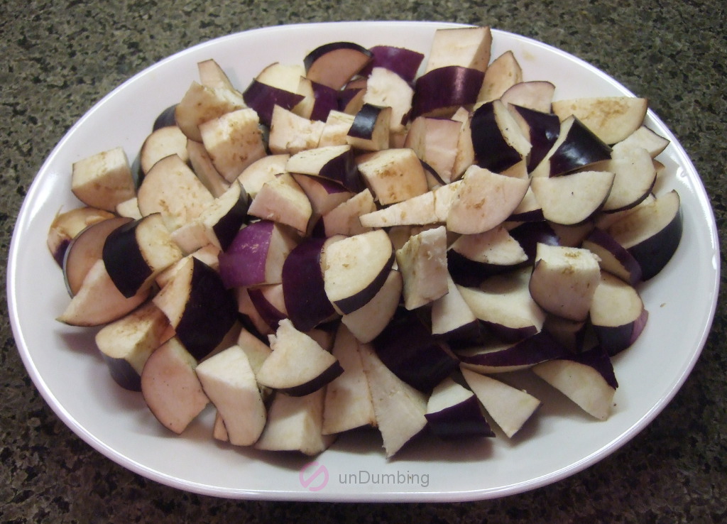 Chopped eggplants on a white plate