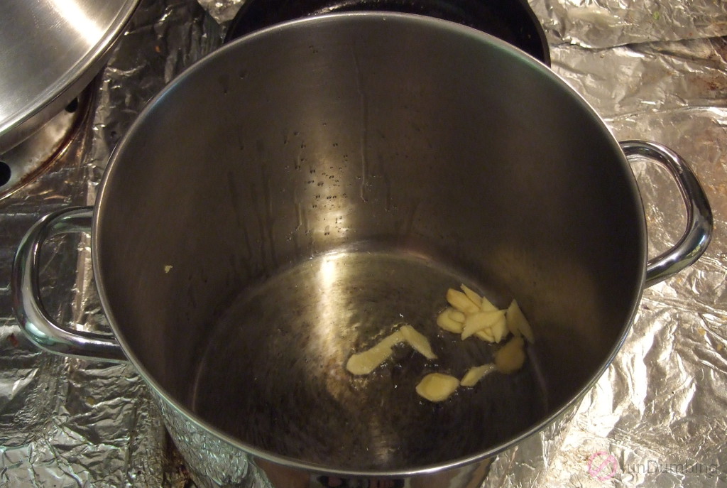 Ginger sautéing in a big pot