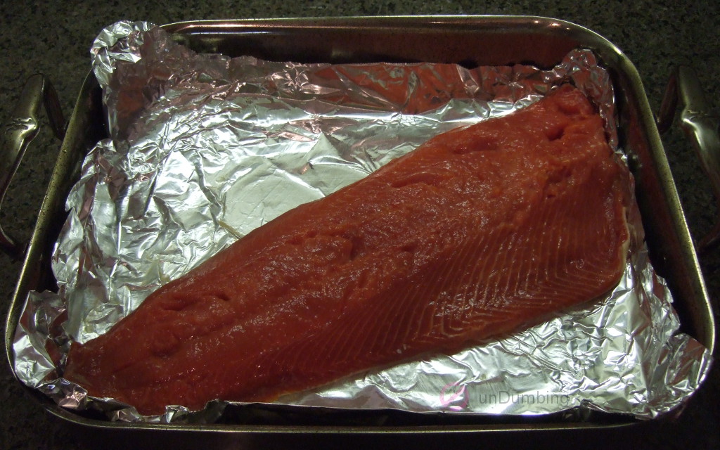 Salmon on a foil-lined roasting pan with marinade removed (Try 2)