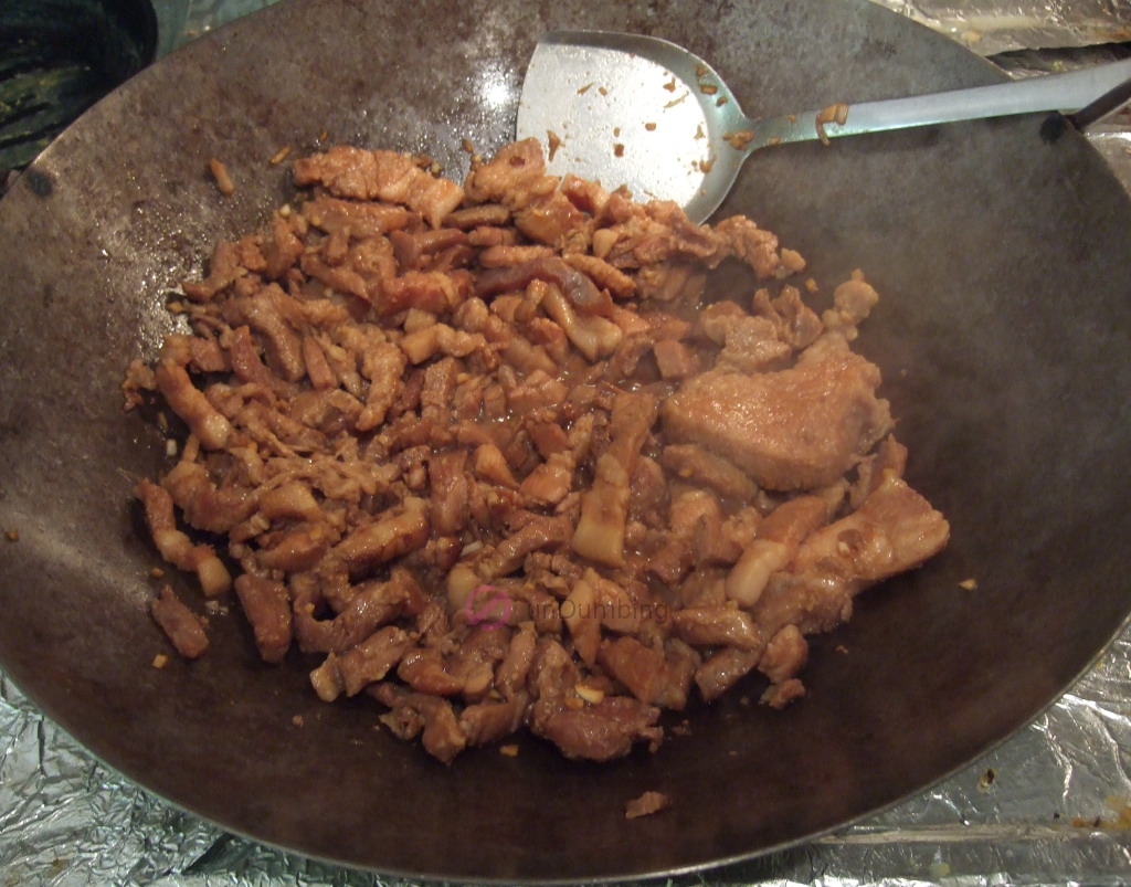 Browned pork belly in a wok