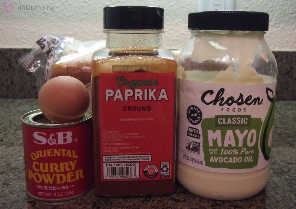 Curry powder, egg, bread, paprika, and mayonnaise