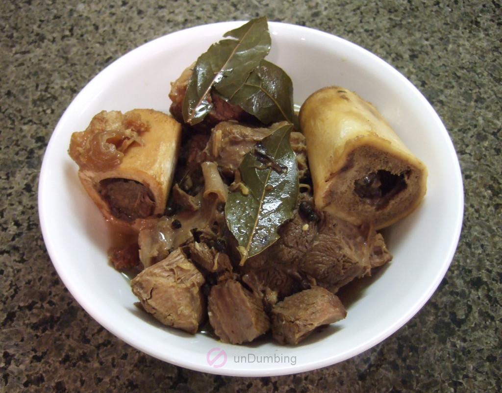 Beef shank adobo in a white bowl (Try 2)