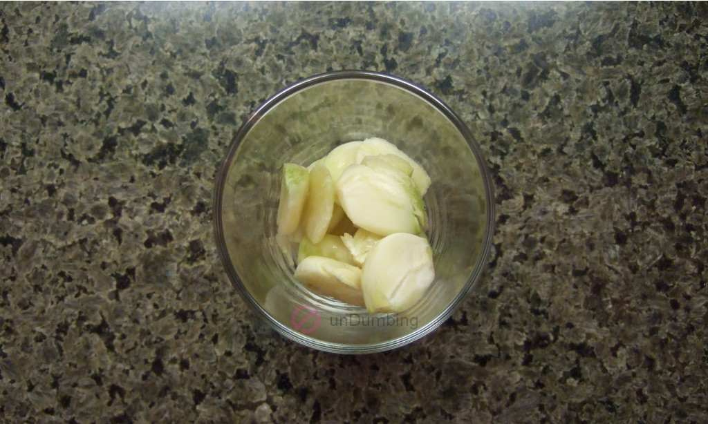Crushed garlic in a shot glass