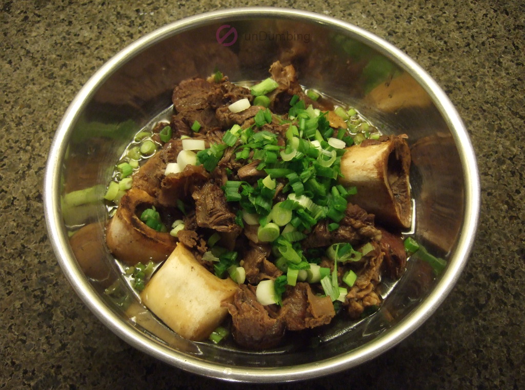 Chinese braised beef shank in a stainless steel bowl