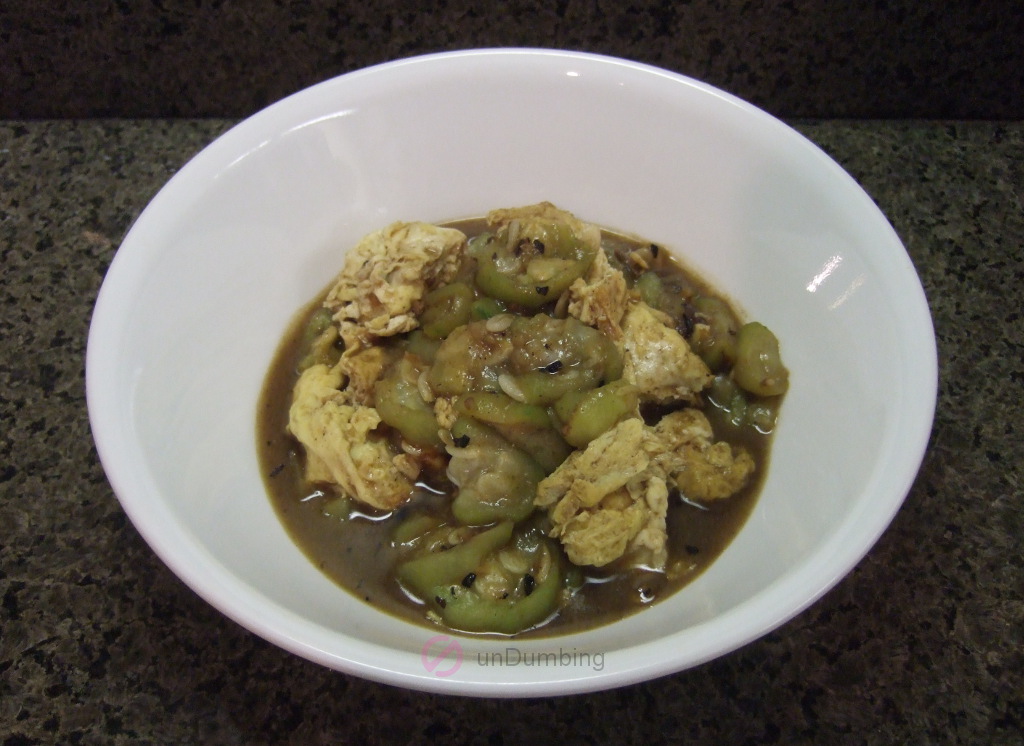 Chinese okra and egg stir-fry in a white bowl