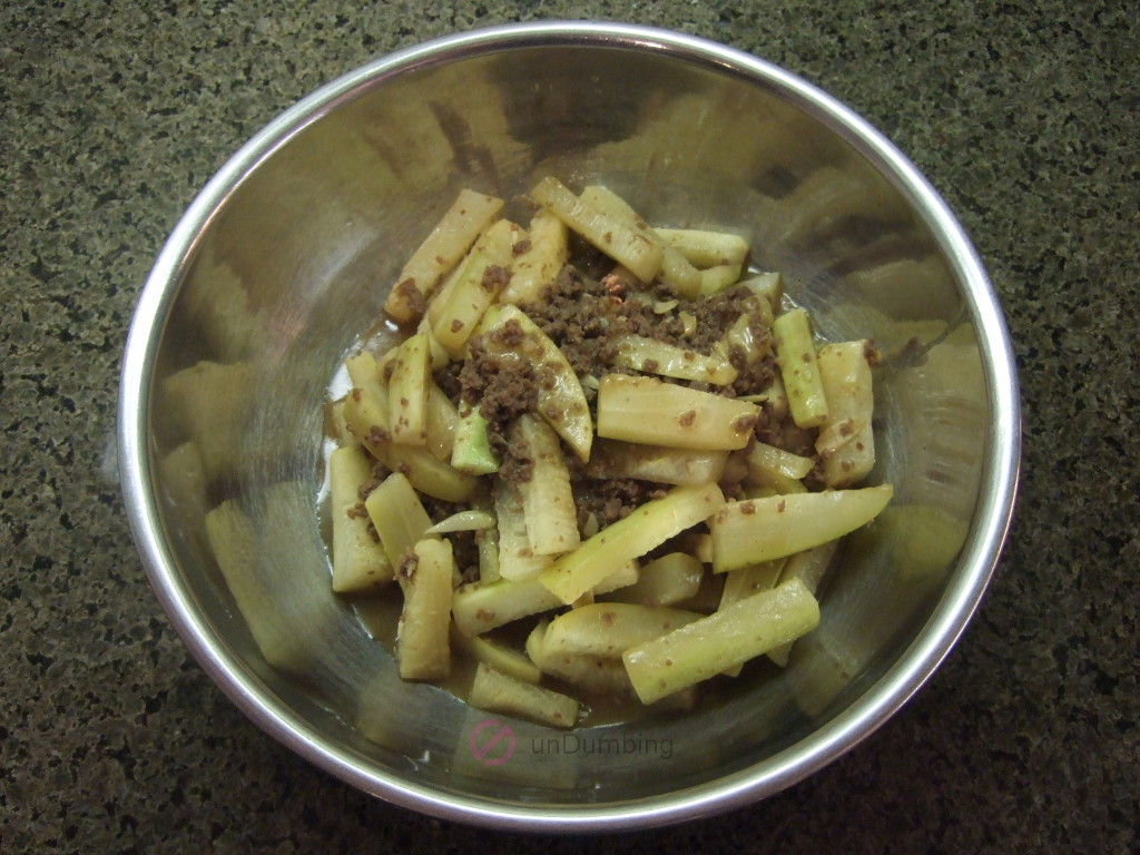 Fuzzy melon with ground beef in a stainless steel bowl (Try 2)