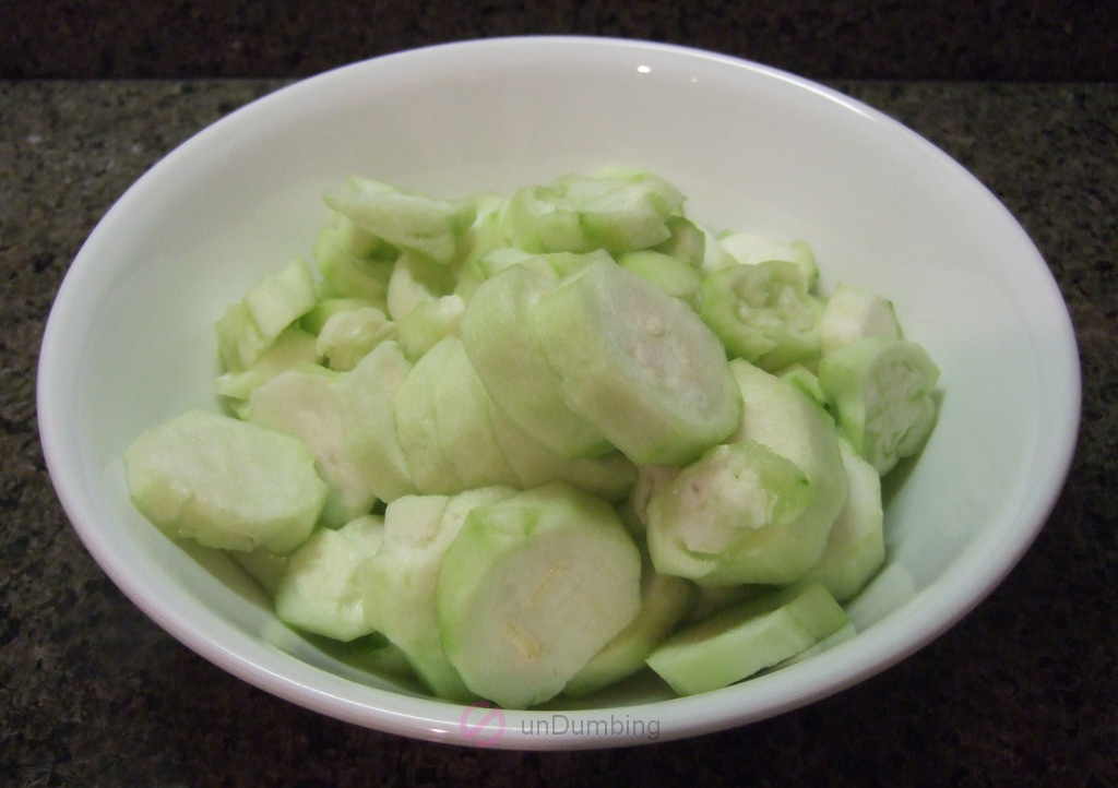 Chopped Chinese okra in a white bowl