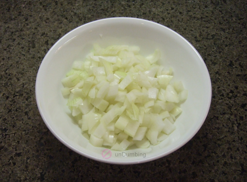 Diced onion in a white bowl
