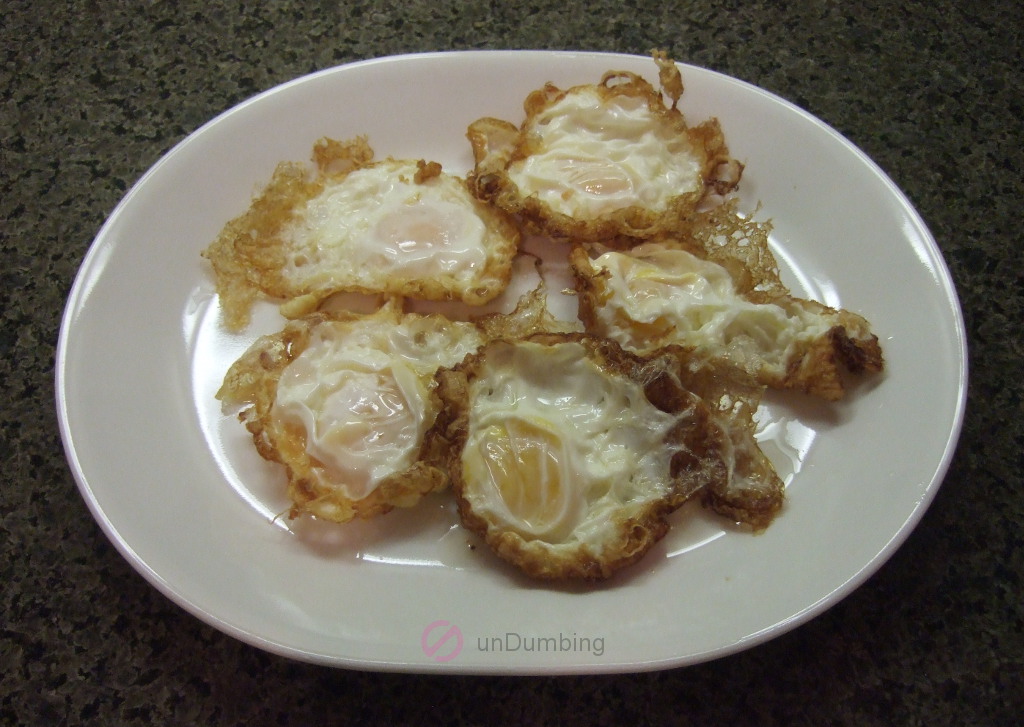 Fried eggs on a white plate