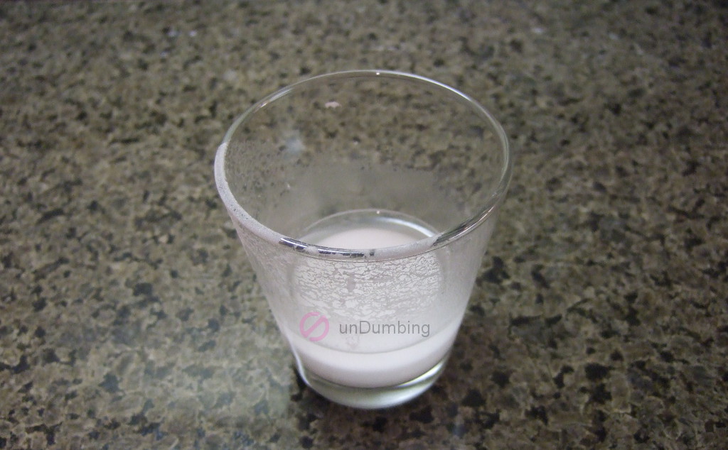 Potato starch mixed with water in a shot glass