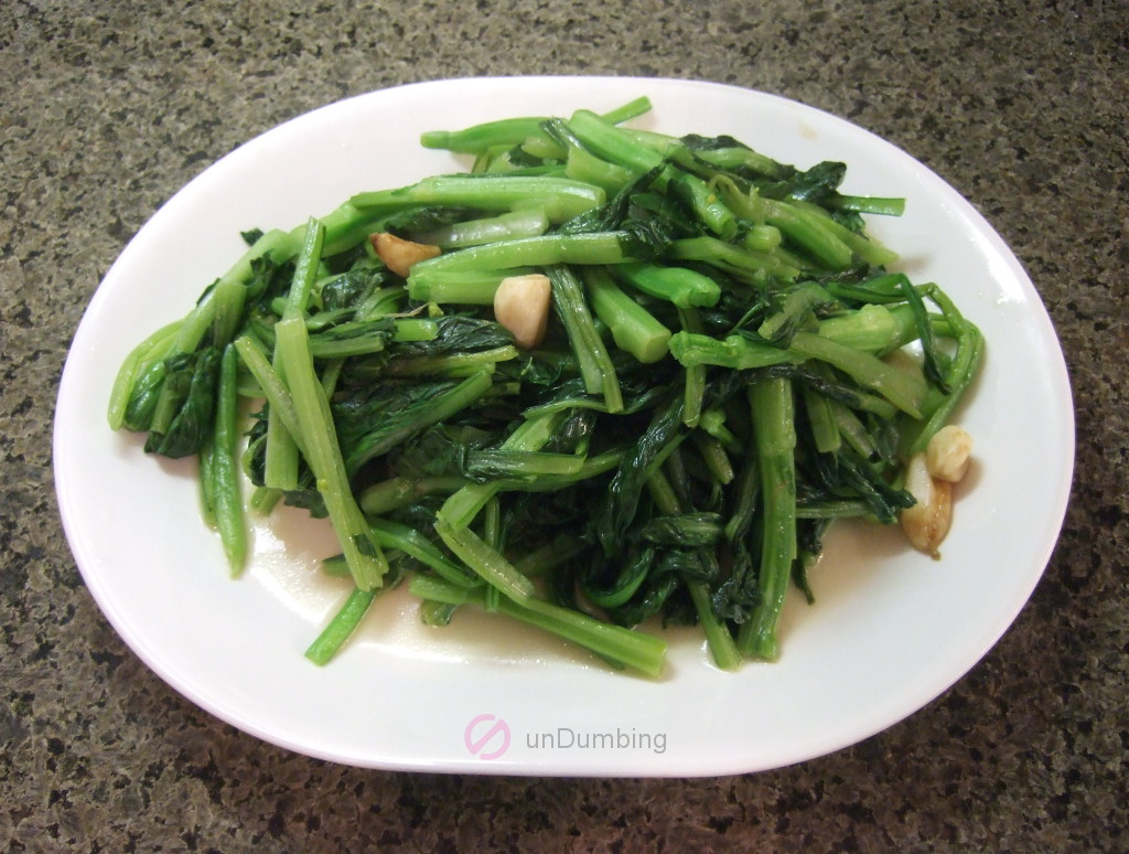 Yu Choy stir-fry on a white plate (Try 2)