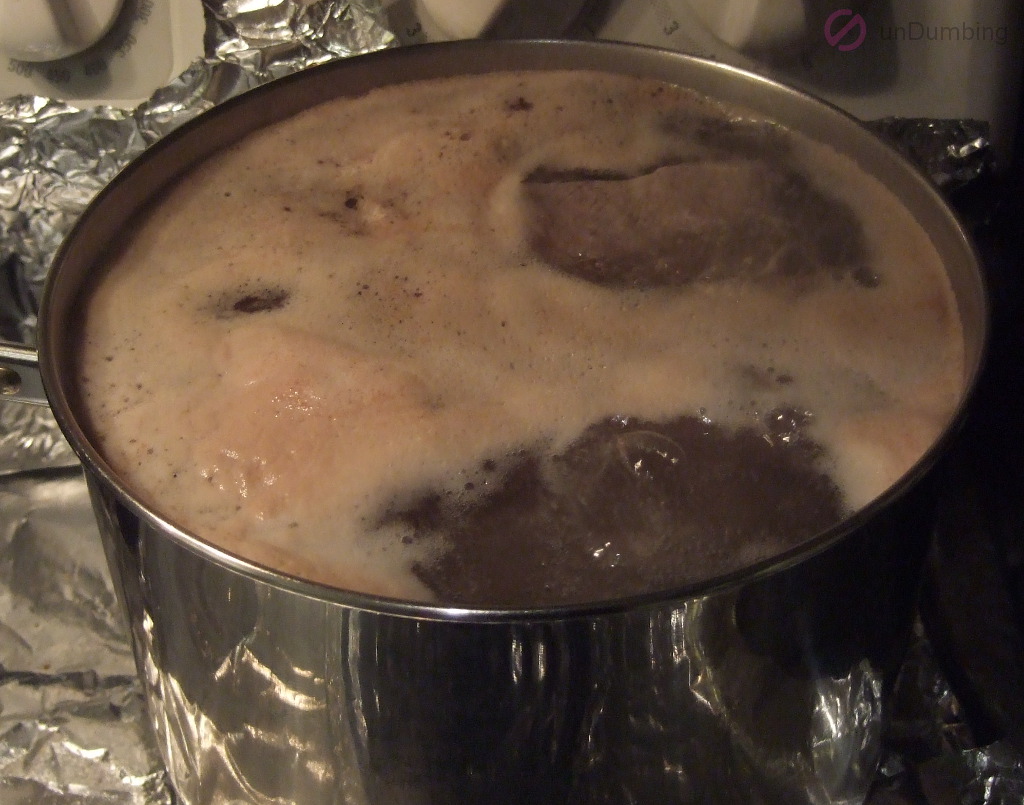 Boiling ribs in a saucepan