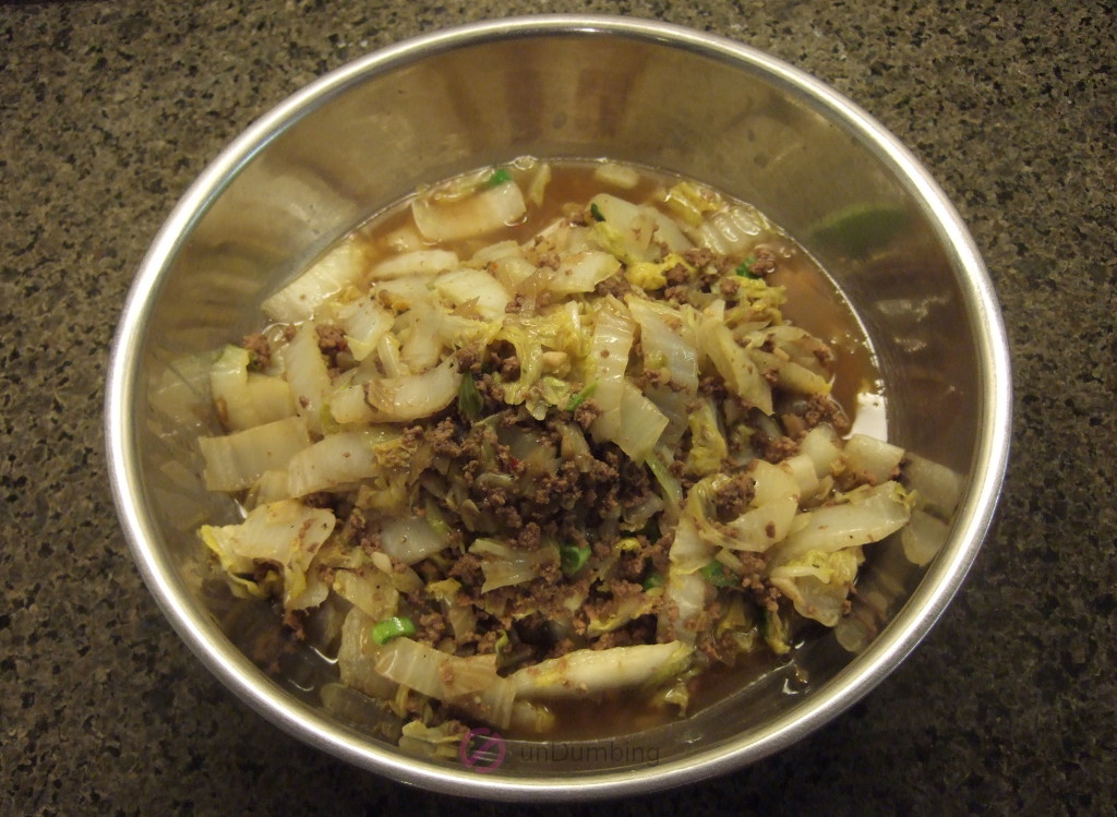 Ground beef and Napa cabbage stir-fry in a stainless steel bowl (Try 2)