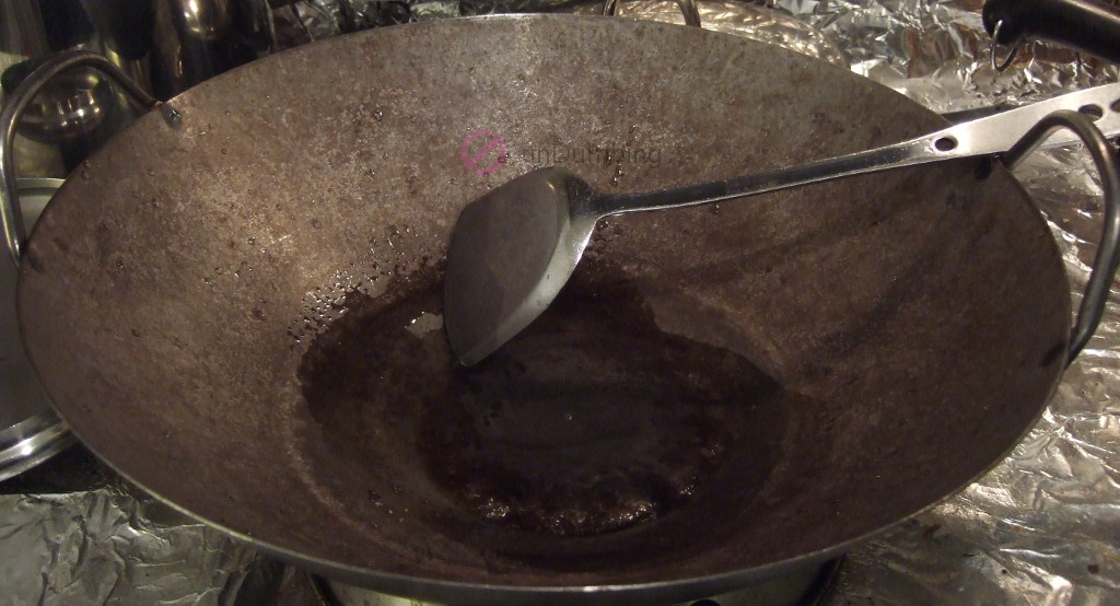 Melting sugar in a wok