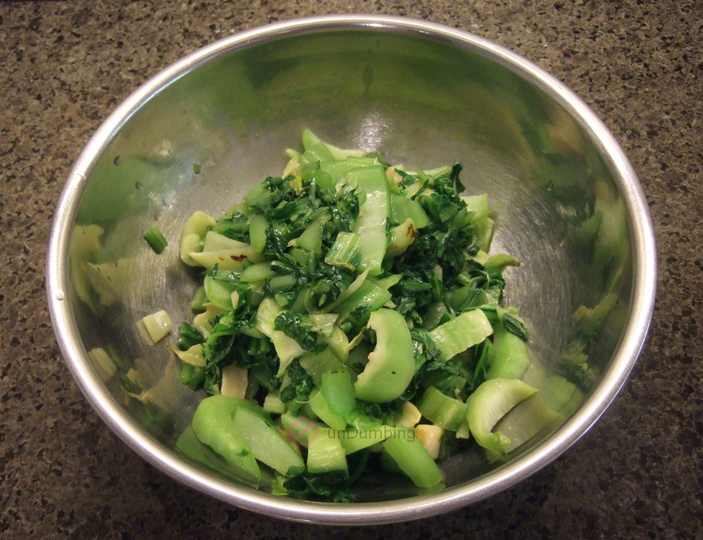 Chinese mustard greens stir-fry in a stainless steel bowl (Try 2)