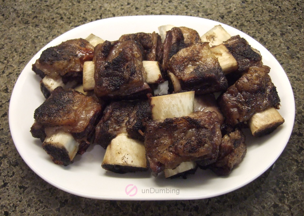 Roasted beef short ribs on a white plate (Try 2)