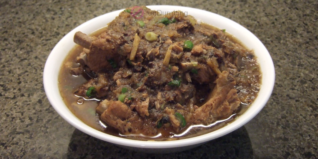 Braised ribs with black bean sauce in a white bowl