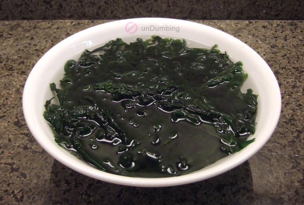 Seaweed soaking in a white bowl