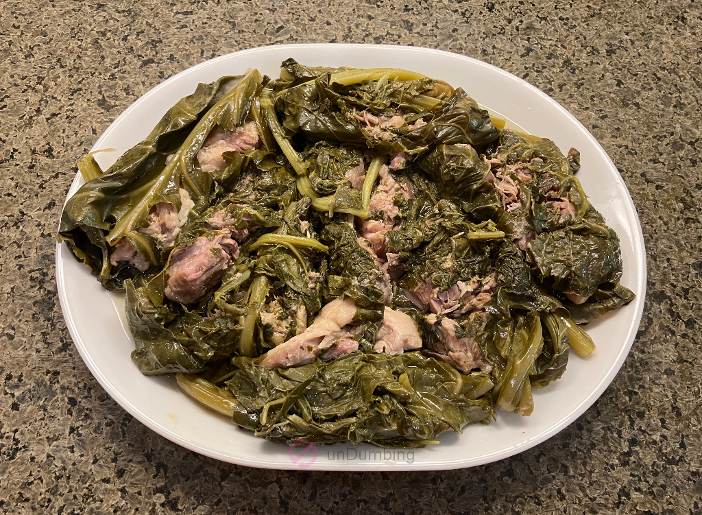 Unwrapped Mainland Lau Lau bundles on a white plate