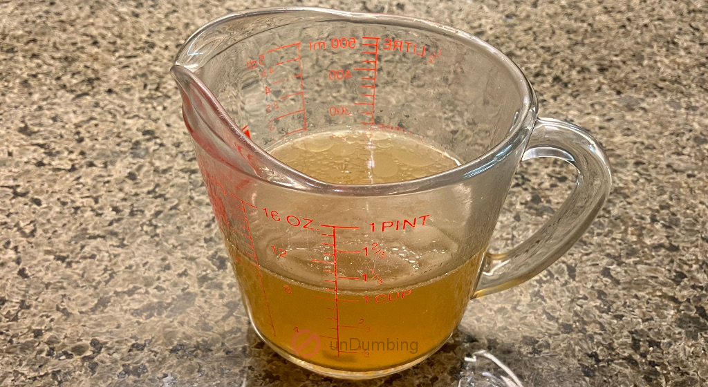 Simmering water in a glass measuring cup